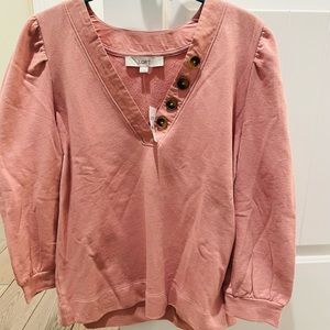 Sweatshirt material top with button accents